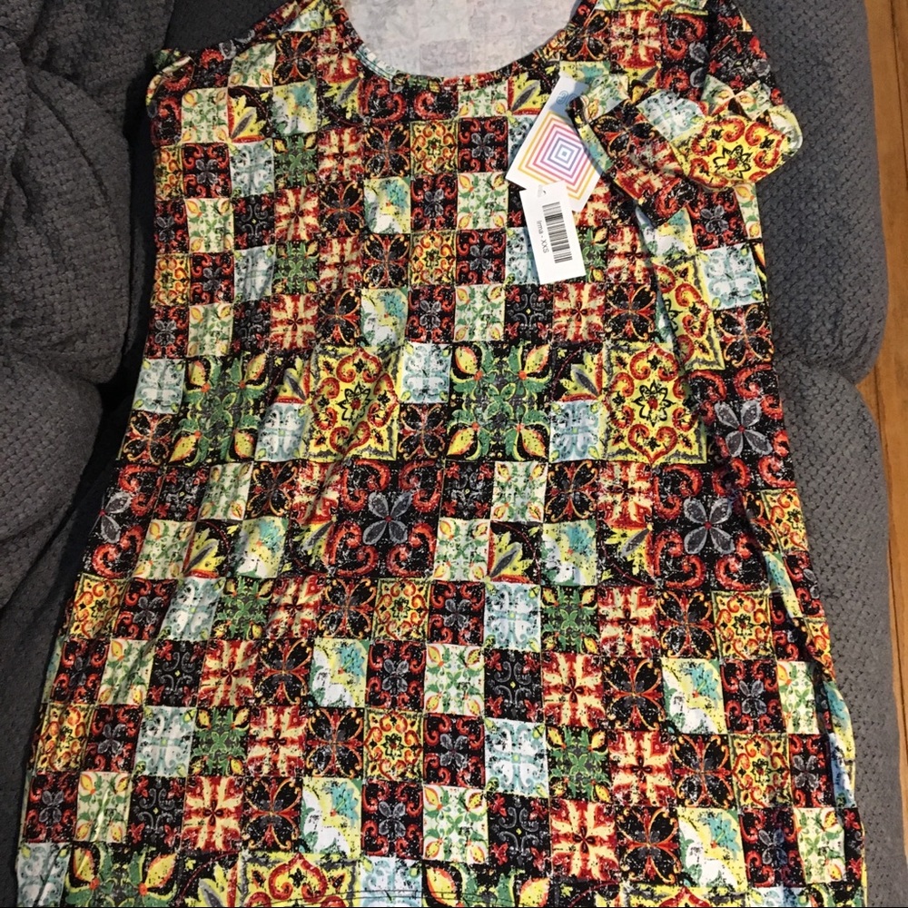 Lularoe xxs Irma shirt. BNWT